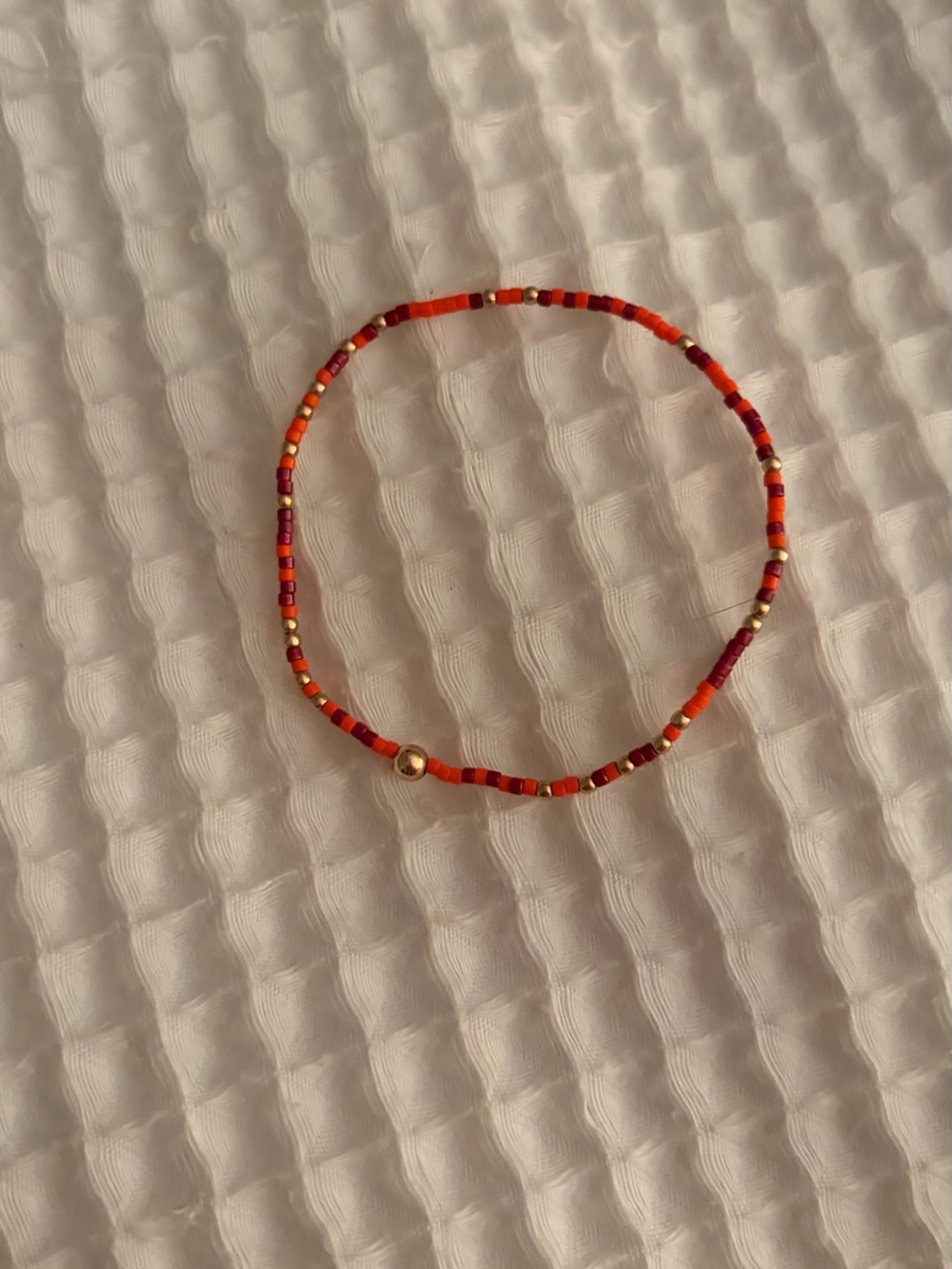 Maroon and orange enewton bracelet
